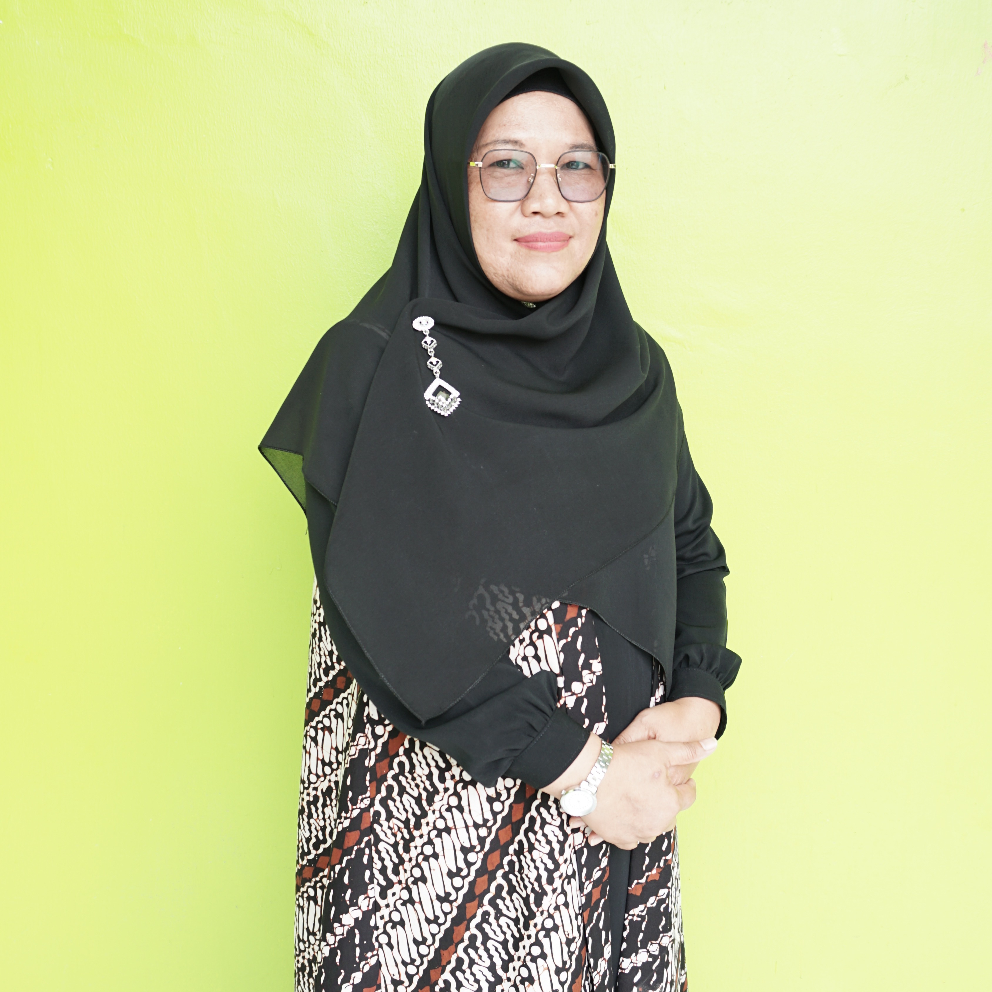 Foto Kepala Sekolah HENNI KURNIA SINAGA, SE. M.Pd